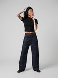 DAXUEN black mock neck buttoned top — model photo