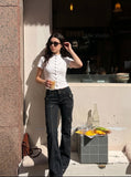 DAXUEN black mock neck buttoned top — model photo