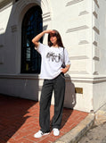 DAXUEN white oversized smoke graphic tee — model photo