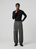 DAXUEN Dark grey wide leg sweatpants with unique graphics — model photo