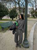 DAXUEN Dark grey wide leg sweatpants with unique graphics — model photo