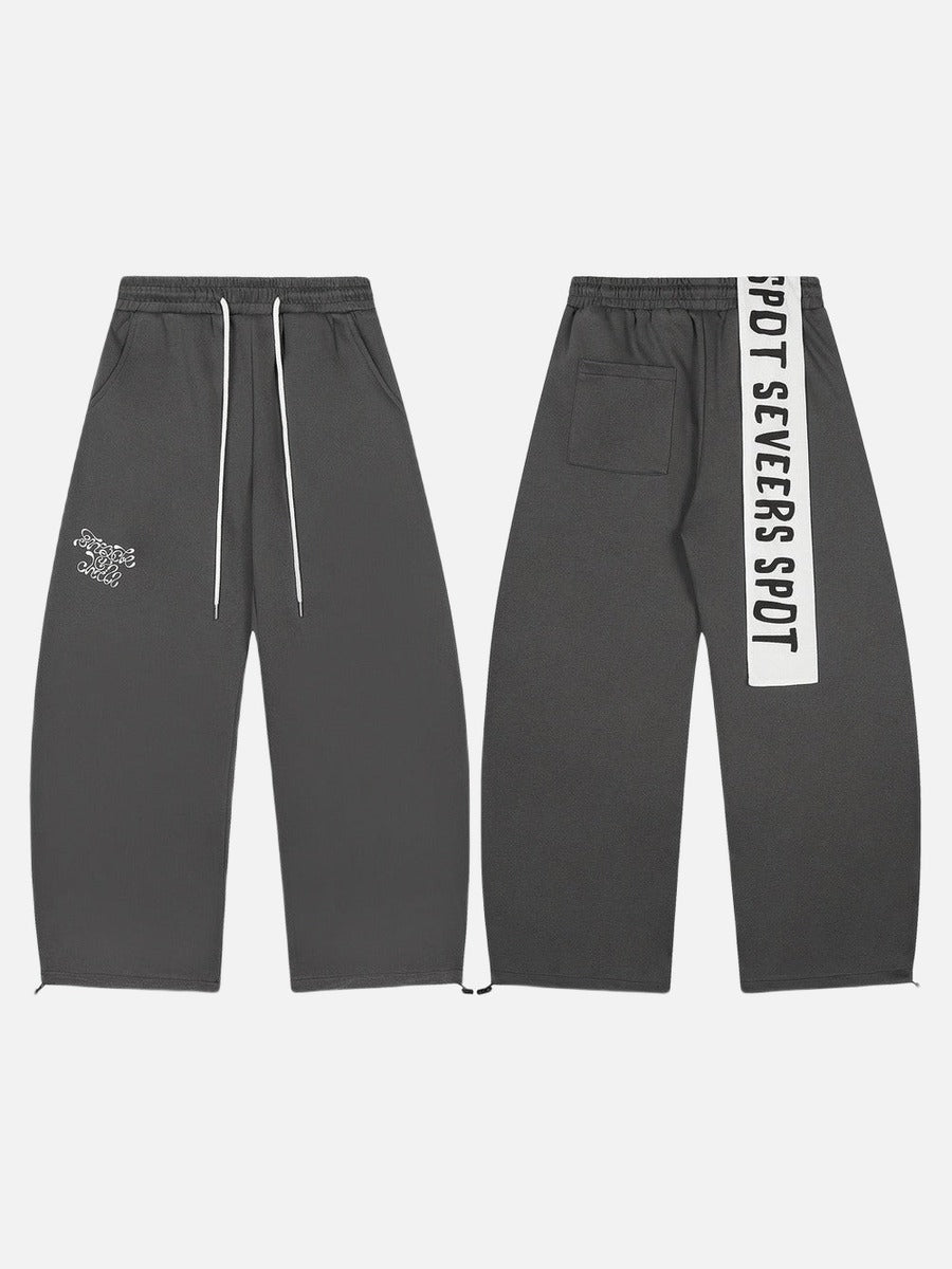 DAXUEN Dark grey wide leg sweatpants with unique graphics