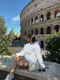 DAXUEN Pullover hoodie with snowflake and paw print embroidery — model photo