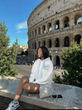 DAXUEN Pullover hoodie with snowflake and paw print embroidery — model photo
