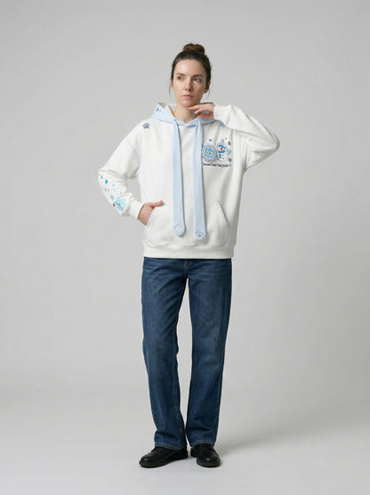 DAXUEN Pullover hoodie with snowflake and paw print embroidery — model photo