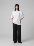 DAXUEN Oversized short-sleeved t-shirt with soccer field graphic — model photo