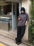 DAXUEN Oversized short-sleeved t-shirt with soccer field graphic — model photo