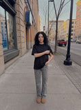 DAXUEN solid black or white relaxed crew neck t-shirt — model photo