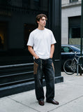 DAXUEN solid black or white relaxed crew neck t-shirt — model photo