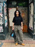 DAXUEN solid black or white relaxed crew neck t-shirt — model photo