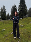 DAXUEN solid black wide-leg trousers — model photo