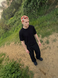 DAXUEN solid black crew neck knit t-shirt — model photo
