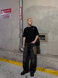 DAXUEN solid black crew neck knit t-shirt — model photo
