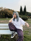 DAXUEN white oversized solid vintage graphic tee — model photo