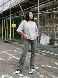 DAXUEN white oversized solid vintage graphic tee — model photo