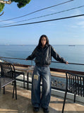 DAXUEN Wide-leg baggy jeans with distressed dark blue denim — model photo
