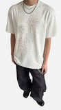 DAXUEN Speckled short-sleeved t-shirt with fireworks embroidery