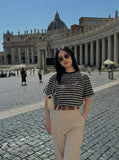 DAXUEN Striped crewneck T-shirt with distressed text print — model photo