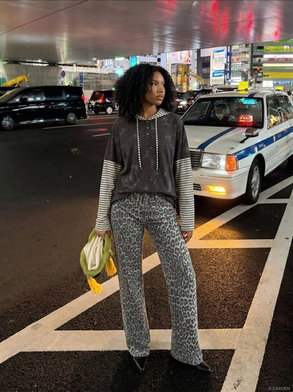 DAXUEN Faux-layered hooded long-sleeve top with splatter print — model photo