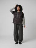 DAXUEN Faux-layered hooded long-sleeve top with splatter print — model photo