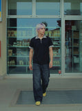 DAXUEN Short-sleeved polo shirt with spot print details — model photo