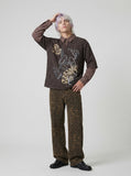 Layered long-sleeve polo shirt with bear graphic — model photo