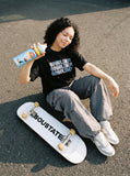 DAXUEN white oversized stacked text graphic tee — model photo