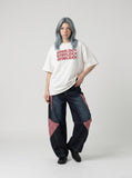 DAXUEN white oversized stacked text graphic tee — model photo