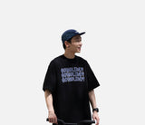 DAXUEN white oversized stacked text graphic tee