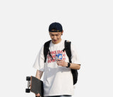 DAXUEN white oversized stacked text graphic tee