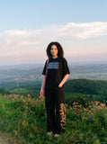 DAXUEN white oversized stacked text graphic tee — model photo