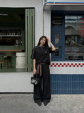 DAXUEN Short-sleeved stand-up collar t-shirt in black and grey marl — model photo