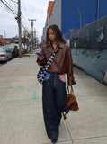 DAXUEN dark blue wide-leg denim pants with star and stripes graphic — model photo