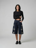 DAXUEN Wide-leg denim shorts with star embroidery — model photo
