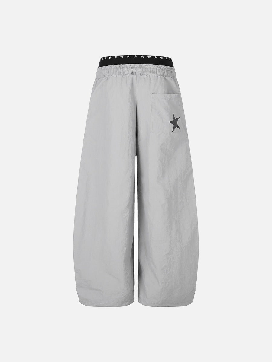 DAXUEN Wide-leg track pants with star graphics
