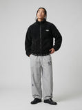 DAXUEN Wide-leg track pants with star graphics — model photo