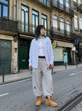 DAXUEN Wide-leg track pants with star graphics — model photo