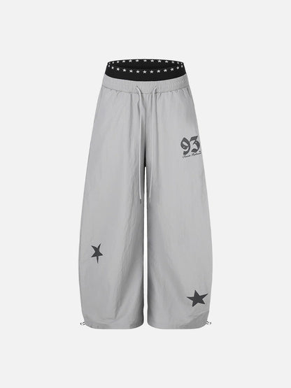 DAXUEN Wide-leg track pants with star graphics