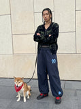 DAXUEN Wide-leg track pants with star graphics — model photo