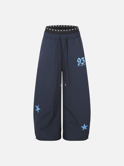 DAXUEN Wide-leg track pants with star graphics