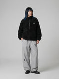 DAXUEN Wide-leg track pants with star graphics — model photo