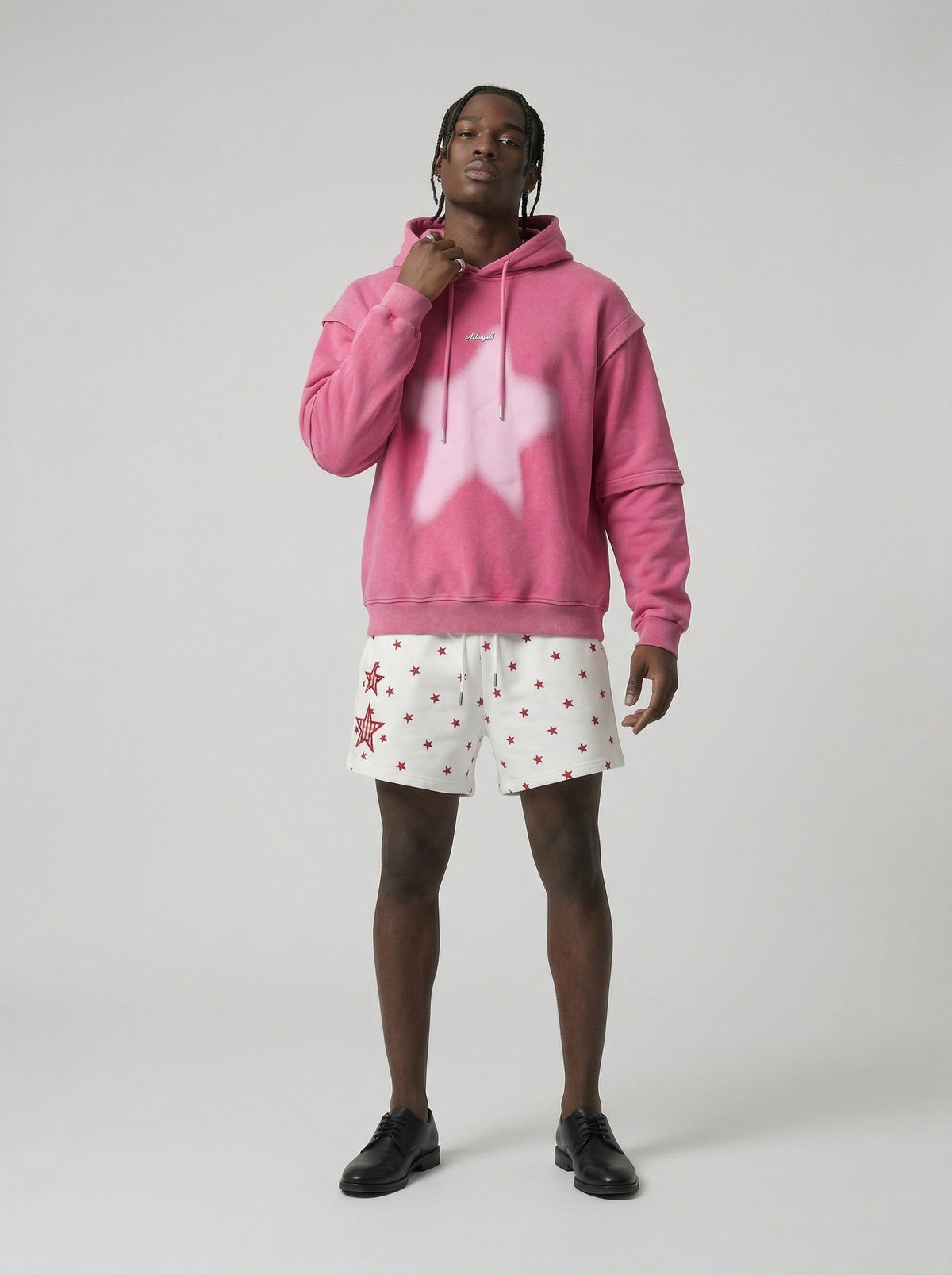 DAXUEN Women's casual shorts with star prints and embroidery — model photo