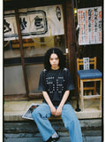 DAXUEN Oversized short-sleeved T-shirt with star graphics — model photo