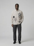 DAXUEN Loose-fitting long-sleeved collared shirt with star graphics — model photo