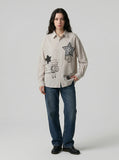 DAXUEN Loose-fitting long-sleeved collared shirt with star graphics — model photo