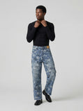 DAXUEN Wide-leg denim jeans with star print and distressed details — model photo
