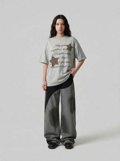 DAXUEN Oversized short-sleeved T-shirt with graphic text and star patches — model photo