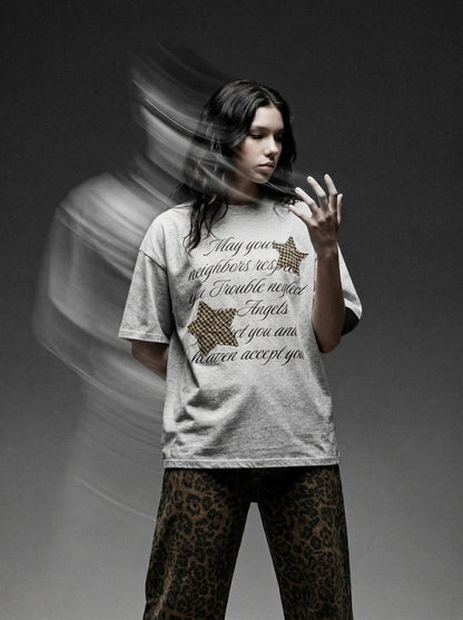 DAXUEN Oversized short-sleeved T-shirt with graphic text and star patches — model photo