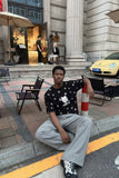 DAXUEN Starry graphic crew neck T-shirt — model photo