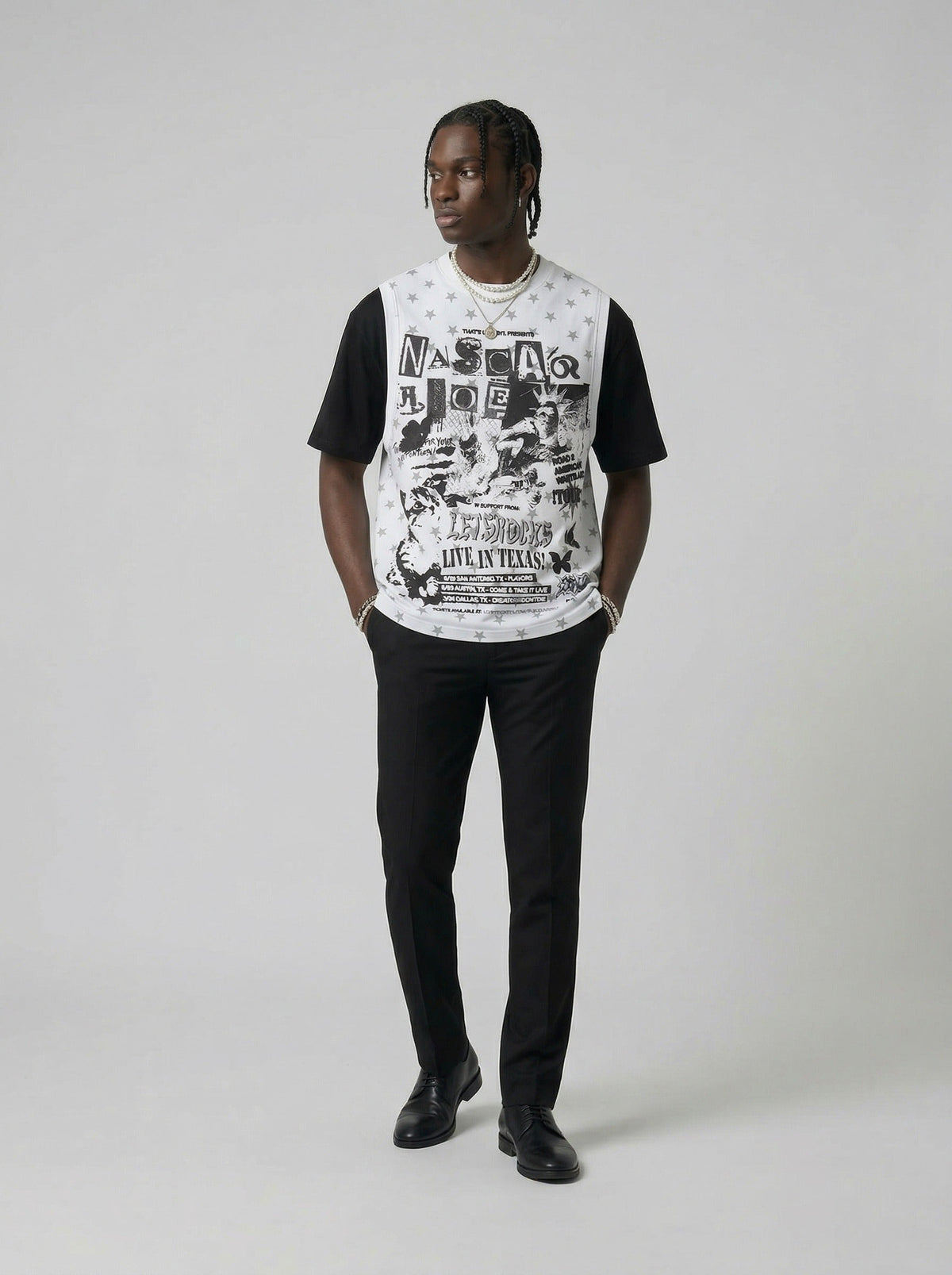 DAXUEN Layered top featuring graphic print vest over t-shirt — model photo